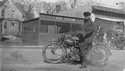 Guy W. Webb on his motorcycle, Wayzata, March 30, 1919