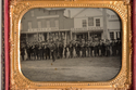 Company D, 1st Minnesota Volunteer Infantry posed at the southeast corner of Nicollet Avenue and First Street, Minneapolis, May 21, 1861