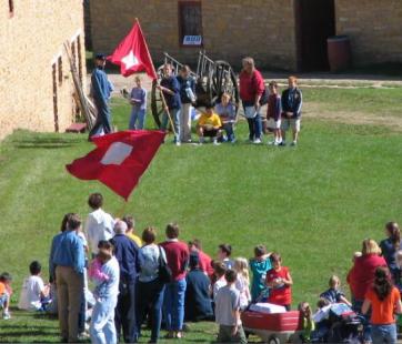 kids play a flag game at Historic Fort Snelling