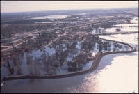 Aerial view of a Grand Forks neighborhood under flood water.