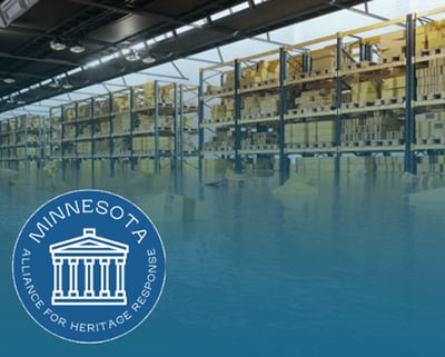 Flooding collection room with  Minnesota Alliance for Heritage Response over photo