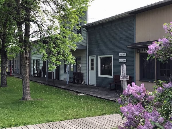 Exterior of Settlers Square showing row of 1800s storefronts