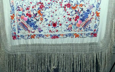 piano scarf is made from silk with a macramé border and fringe