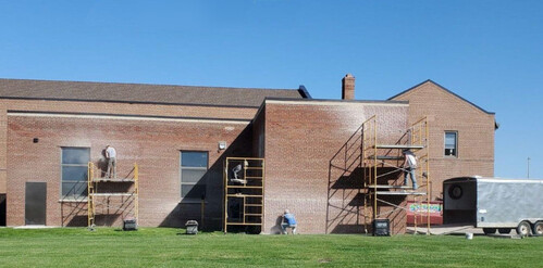 Brickworkers working on the Worthington Armory
