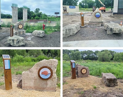 A construction site for the Wakan Tipi Center Exhibit featuring stone structures, and informational panels in a natural setting.