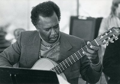 James Condell playing guitar