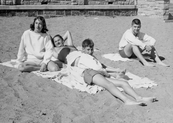 A family of four spending Labor Day on Bde Maka Ska beach