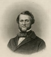 Engraved image of a man's head and shoulders. He wears a suit jacket and a bow tie. He has a beard and curly hair.