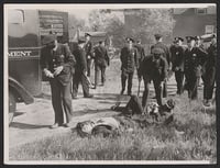 Police gather around injured striking workers