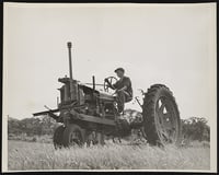 Black and white photograph of a Farmall tractor on the farm of Mike O'Boyle, St. Paul Park, 1938.