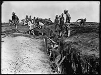 Black and white photograph of officers-in-training building a trench at Fort Snelling, 1917.