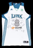 White basketball jersey with blue details, the word "Lynx," and the numeral, with a black background.