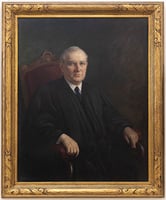 A painting of a man wearing dark judicial robes, a black tie, and a white collared shirt. He sits at a three-quarter angle in a red upholstered chair. The painting is housed within an ornate golden frame.