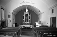 Black and white photograph of the altar of Old Westbrook Church, Cottonwood County, 1972. Photograph by Clifford M. Renshaw.