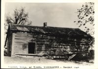 Black and white photograph of Finnegaard pioneer home, Holden.