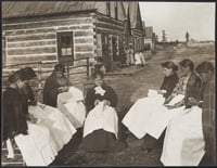Photograph of lace makers working outdoors at the Leech Lake Reservation