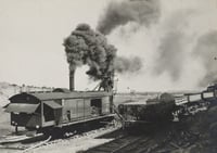 Oliver Mining Company steam-powered shovel near Hibbing, 1919. A shovel removes overburden, the rock and soil that covers the ore body, so that miners can access the ore from the open pit.