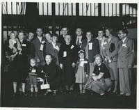 International Institute Committee welcoming refugees in New York Harbor, 1952