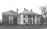Photograph showing Colonial Hall (right, built in 1904) after Masonic Lodge No. 30 (left, built in 1922) was built beside it. Photographer unknown, ca. 1970s.