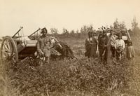 Black and white photograph of Ojibwe with Red River carts near Fort Dufferin, Manitoba, Canada,