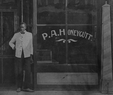 Prince Honeycutt outside his barbershop