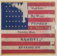 Tattered battle flag of the Seventh Minnesota Infantry Regiment.