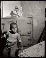 A_young_boy_who_lives_near_the_nations_capitol,_fsa.8b14755,_edit