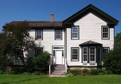 Color image of the Banfill Tavern, now Banfill-Locke Center for the Arts, 2013. Photographed by Wikimedia Commons user McGhiever.