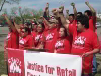 Members of the Centro de Trabajadores Unidos en la Lucha (Center of Workers United in Struggle, CTUL) rally to support retail cleaning workers and their legal fight to collect unpaid wages from big-box employers like Target and K-Mart, 2014. Used with the permission of CTUL photographer unknown.