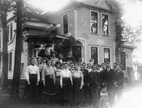 Black and white photograph of Hutchinson High School class at Harrington-Merrill House, Hutchinson, 1900.