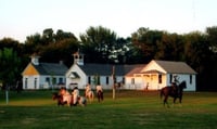 Color image of the reenactment of courthouse battle during the Murray County sesquicentennial celebration, 2007.