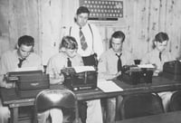 Black and white photograph of the Adult education program at the Civilian Conservation Corps camp at Maple Lake, ca. 1938.