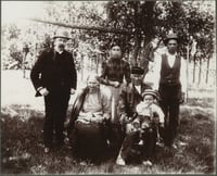 The Dakota leader Good Thunder (seated) and his family. Photographed at the Lower Sioux Dakota community in Redwood County c.1900.