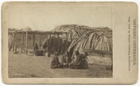 Black-and-white photograph of a Ho-Chunk (Winnebago) encampment taken by Whitney's Gallery, c.1865.