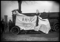 University of Minnesota Homecoming display with Ku Klux Klan banner, ca. 1923.