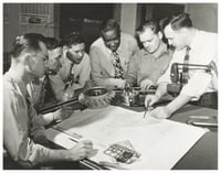 Black and white photograph of Frederick McKinley Jones and drafting team, c.1960.
