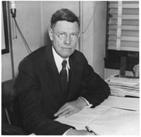 Dr. Frederick Kuhlmann, Director of the Division of Research under the State Board of Control. Photograph for the St. Paul Daily News, ca. 1930.