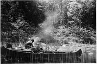 Ca. 1910 image of Ernest Oberholtzer on a canoe trip in the Quetico–Superior region.
