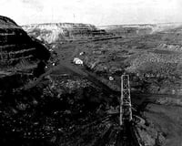 Mining at the Spruce Mine in Eveleth, ca. 1940. The Spruce Mine was one of many Oliver-controlled mines throughout the Mesabi Iron Range.