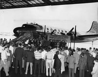 Black and white photograph of the inauguration ceremonies for Northwest Airlines' first flight over the Great Circle to the Orient, 1947.
