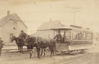 Black and white photograph of a bobtail horsecar 94, St. Paul City Railway Company sign reads Rice Street to West St. Paul via Robert, Ducas, and Concord Streets, c.1883–1889.