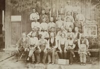 Black and white photograph of St. Paul and Pacific Railroad employees, 1873. Photographed by Redington & Shaffer.