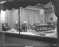 Black and white photograph of furniture window display, c.1920.