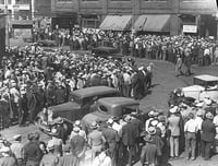 Black and white photograph of a street scene, Truck drivers’ strike, 1934.