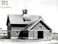 Black and white photograph of the horse barn at the Northwest Experiment Station.