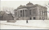 Black and white photograph of a library building designed by Keck in 1904 and completed in 1908. Located at 120 North Ash Street.