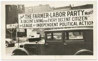 A Farmer-Labor political poster atop an automobile, ca. 1925.