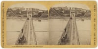 Black and white photo negative of the Hennepin Avenue Bridge, c.1868.