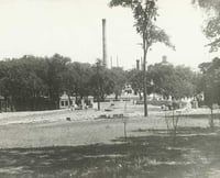 Black and white photograph of the wading pool being built in Central Park, 1929.