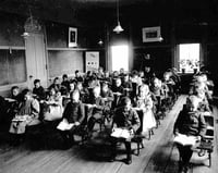 Black and white photograph of a classroom at the State School, c.1905.